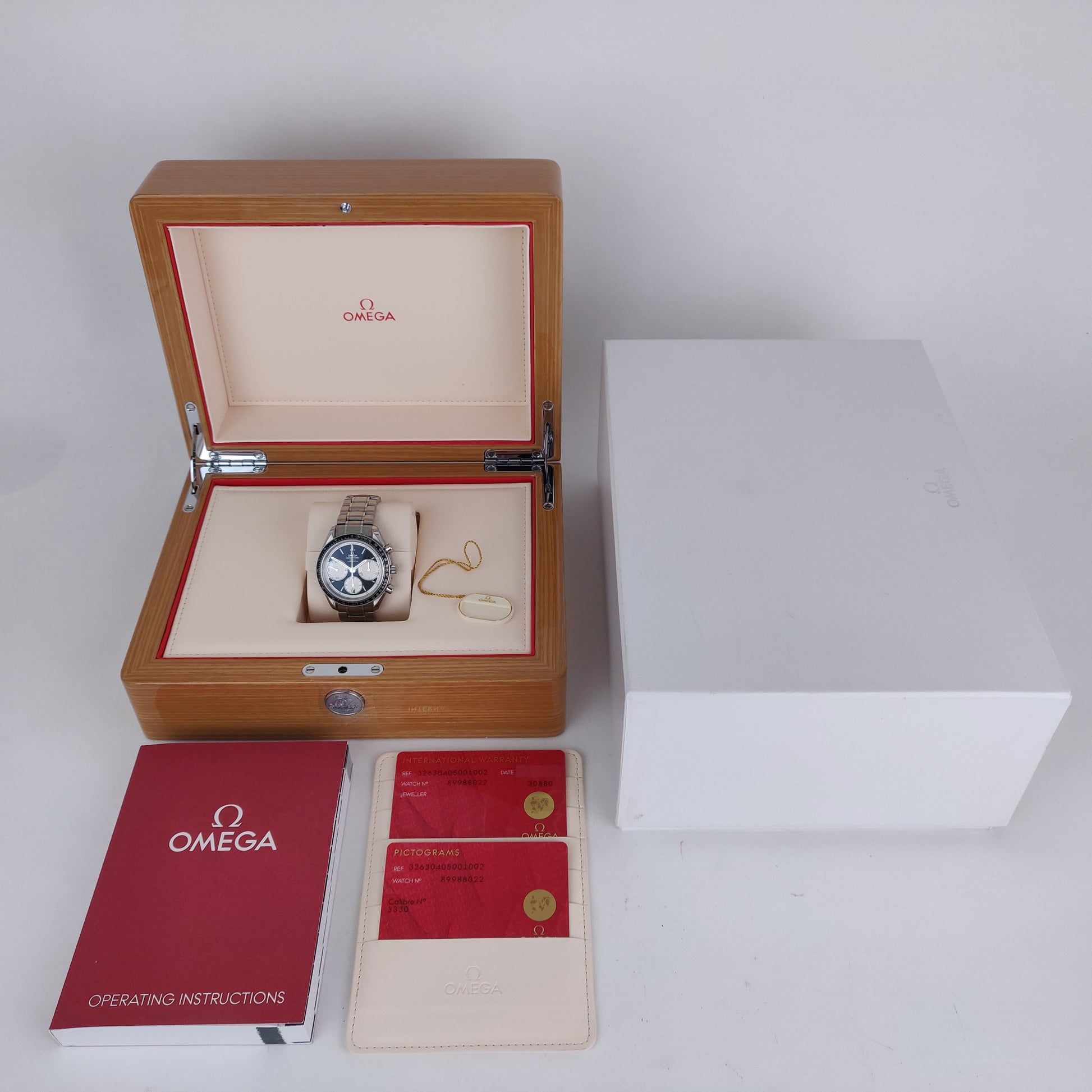 Omega Speedmaster Racing 326.30.40.50.01.002    | Box & Papers